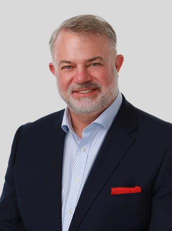 Portrait of Dr. W. Eric Martin at his dental practice in Champaign, IL