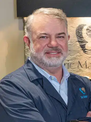 Portrait of Dr. W. Eric Martin at his dental practice in Champaign, IL